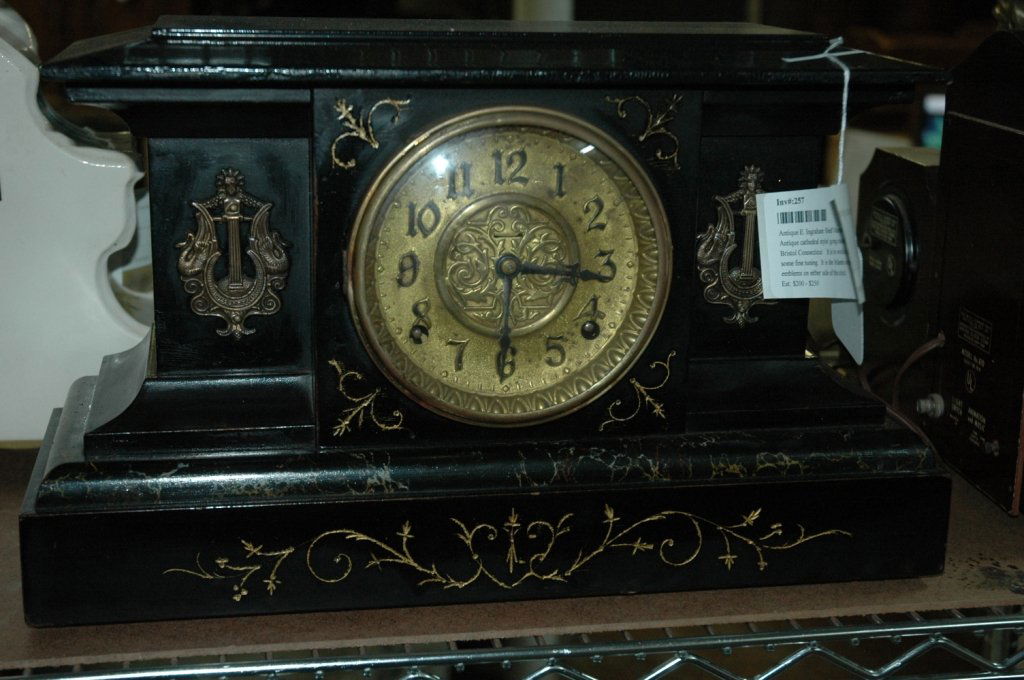 Antique E. Ingraham Shelf Mantel Clock,: This rare Antique cathedral style/ gong mantle clock, was manufactured in Bristol Connecticut . It is in working condition, but might need some fine tuning. It is the Atlantis model which features nau