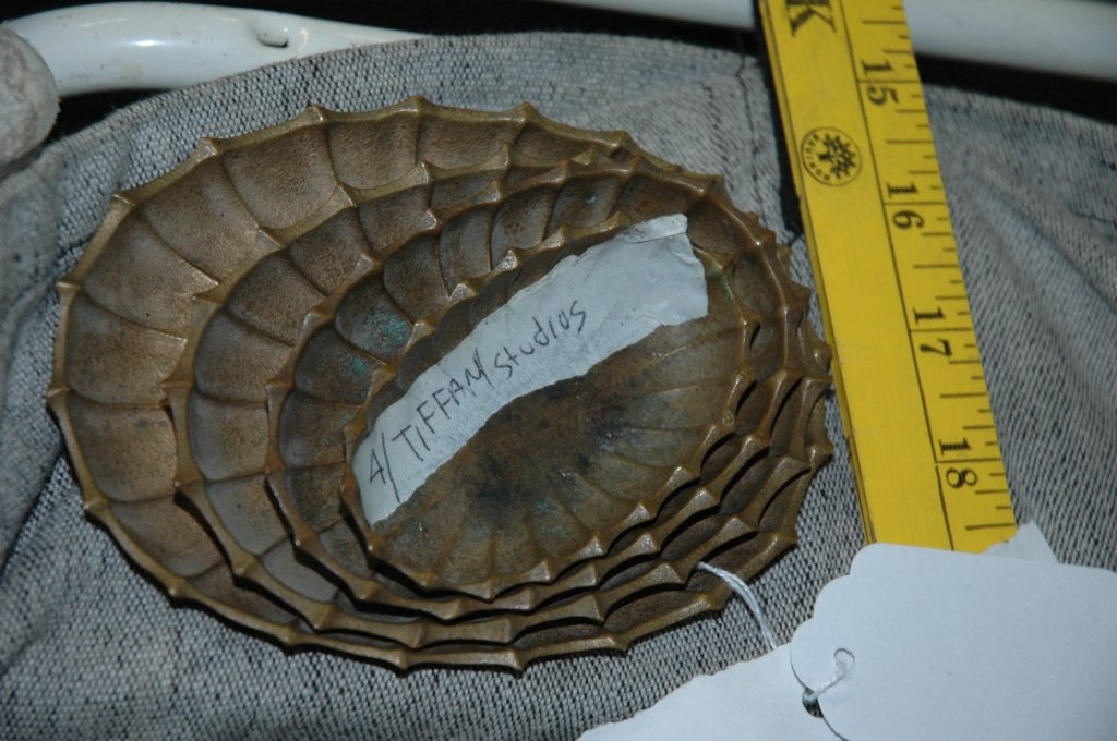 TIFFANY Studios New York: Complete set of 4 bronze shell dishes from TIFFANY Studios New York model 1859. In great condition. Approx. Meas. Large one 5 1/2"x 4" to the Small one 3 1/2"x 2".
