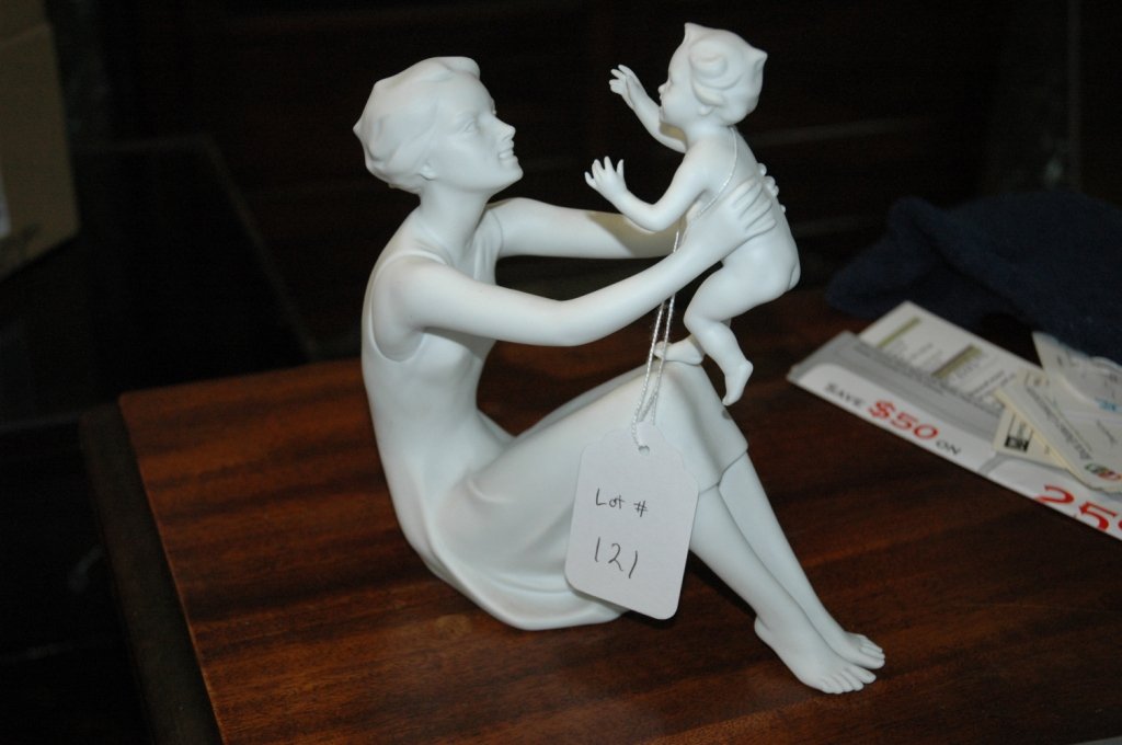 "Kaiser" Made In Germany: Mother Holding baby.