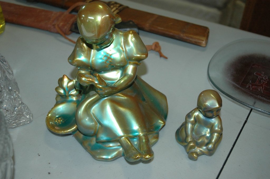 Zsolnay: Zsolnay Hungary Eosin Sitting Girl 3 in. tall. & Girl by bird bath. Sits 6" tall. Iridescent green/gold glaze on porcelain. Marked "Zsolnay Hungary 1853 PECS Handpainted"