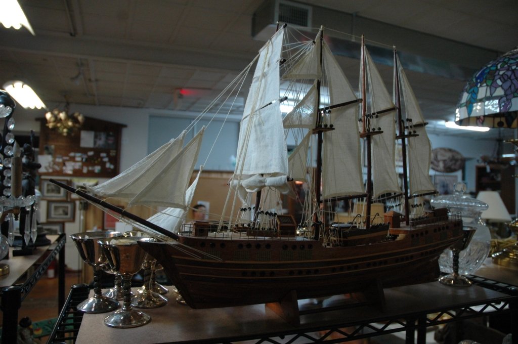 "Esmerelda" Model ship: Handcrafted wooden model. Cloth sails; 21in. H. x 32in. W.