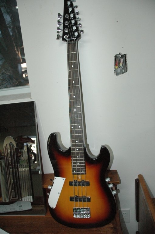 Combo Double sided Bass and Electric guitar: That's right. One side is an Electric Guitar. The other side is a Bass. So if your in the mood to shred some riffs or slap the bass you need not to go far.