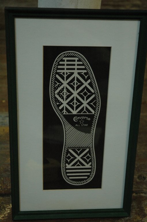 Advertising for converse shoes: 15x9 black and white converse all star shoe