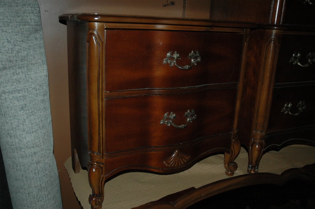 3 piece bedroom furniture set: From early 1900s. Has one 2 drawer dresser 27"x15"x26. One 5 drawer dresser 38"x19x52. One 9 drawer dresser 66"x19"x32 with 51"x34" mirror to hang over dresser or on wall in room.