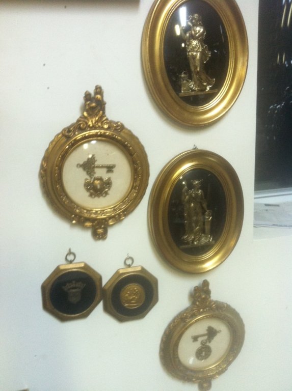 6 piece Andrew Kolb and son collection: 2 6" round framed silk paintings of city streets. 2 Lock and key with Victorian trimmings. 2 Greek style art 9x7.