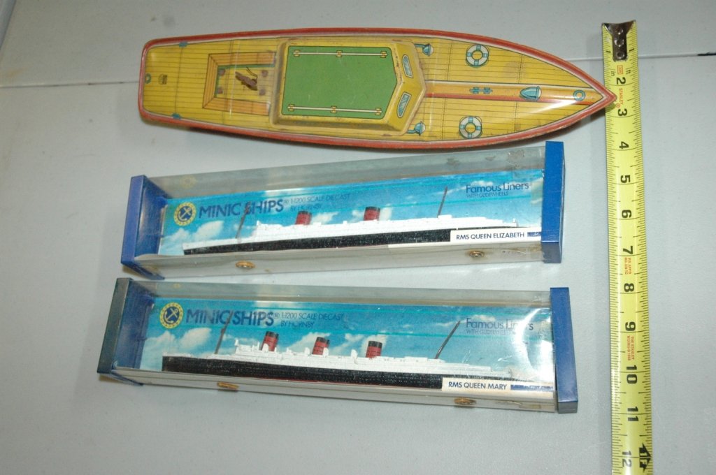 3 Piece Toy Boat lot: The Queen Mary & The Queen Elizabeth 12" in box, both by Hornby. The " Peggy Jane " by J. Chen 14.5", A small wooden car ferry , with 2 cars.