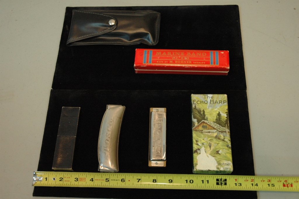 Hohner Harmonica collection and more: The Echo Harp, Marine Ban No. 365, GLH Great Little Harp, and the Blues Harp all made by Hohner. With Super 48 Chromatic, and the HR Tosca