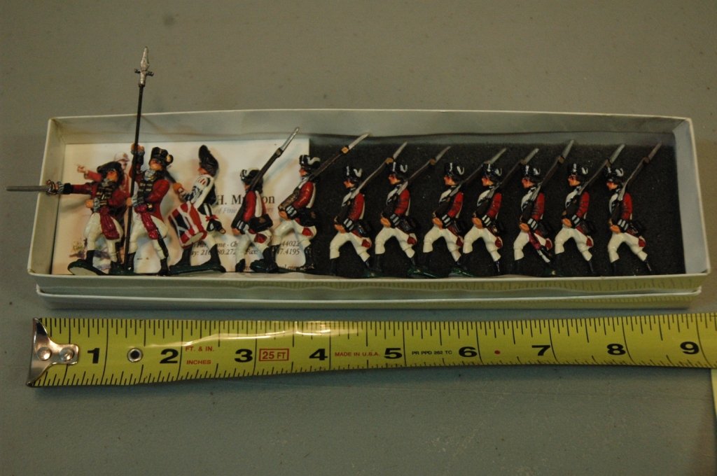 British Brigade Miniature: This 12 piece hand painted 12 piece collection, the tallest figure with spear is just over 3" tall.