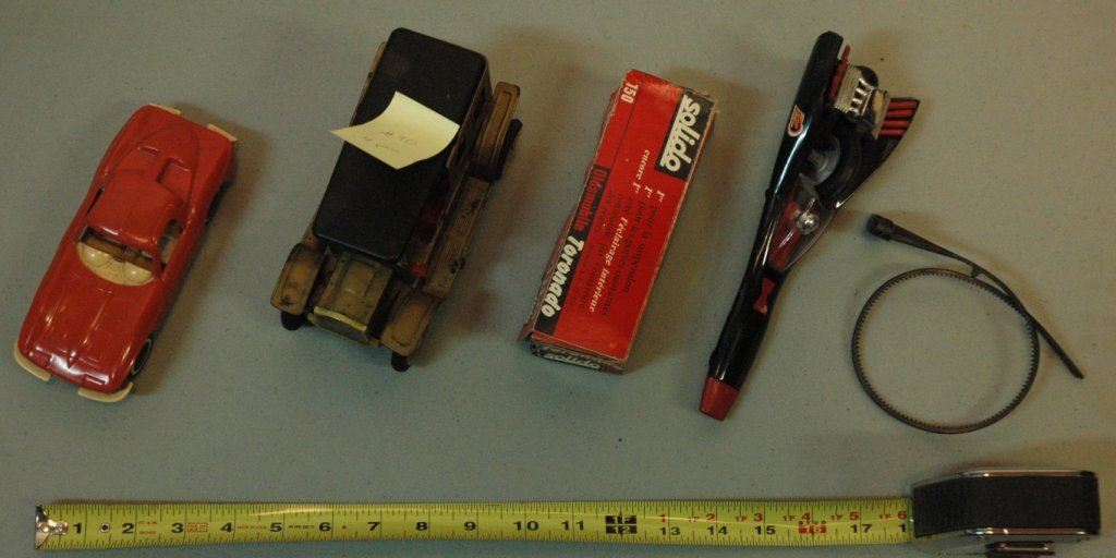 Collection of vintage toy cars: Kenner SSP gyro car named " Black Jack " in working condition with rip cord, Oldsmobile Toronado " Haute Fidelite " made in France ( with box ) , and an early model battery operated car. All AS IS