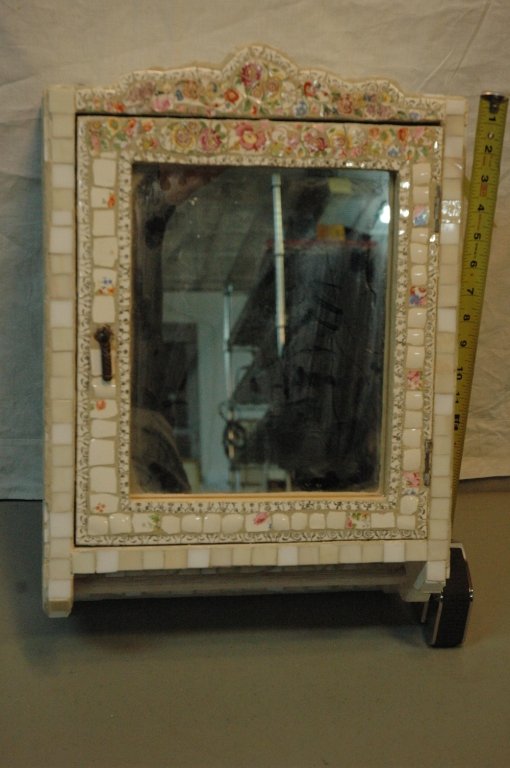 Vintage Mosaic vanity cabinet: Intricate detail on this hand made cabinet. Mirror on door with towel bar on bottom. 14" X 20" X 7"