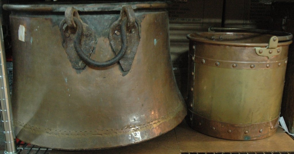 A group of 3 old copper pots: Largest copper pot, appx. 21" diameter x 14" tall.