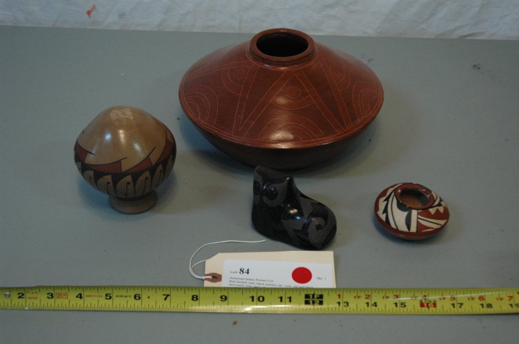 American Indian Pottery Lot: Red incised vase, black pottery cat / owl, red and black decorated vase, and a Tona H. Dez vase.