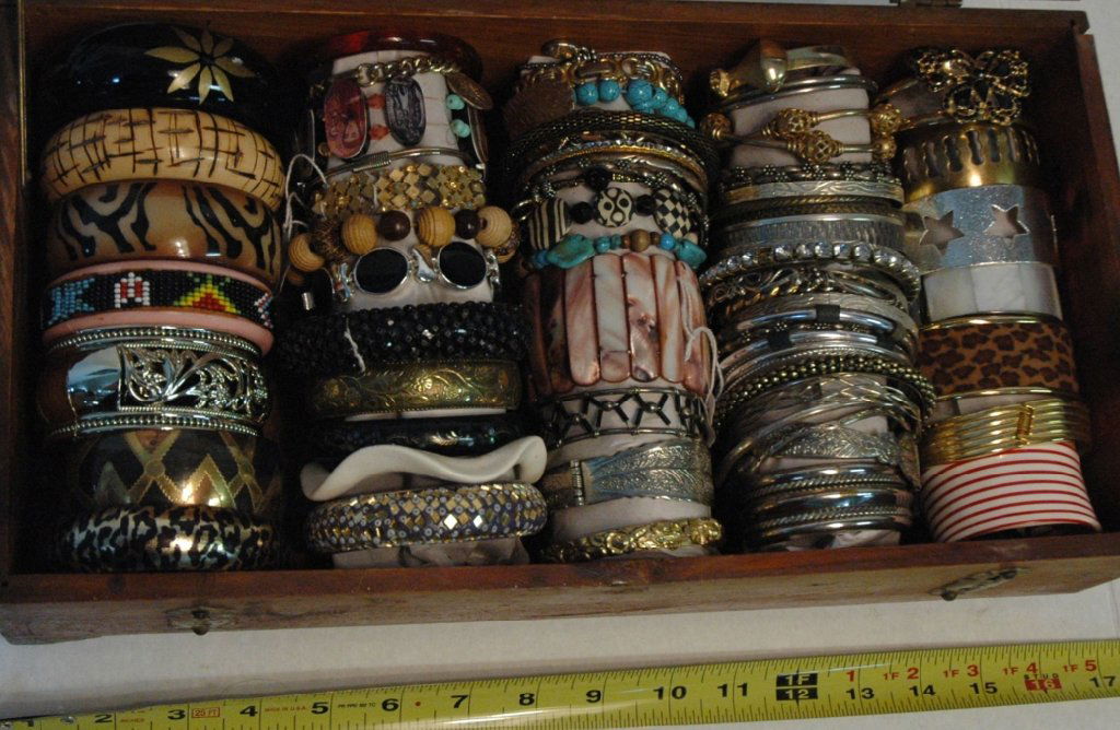 80 Vintage Bangle, Cuff, and link bracelets: Silver metal, Stainless, Beaded, Shell, wood and stone. A variety of sizes shapes and designs.