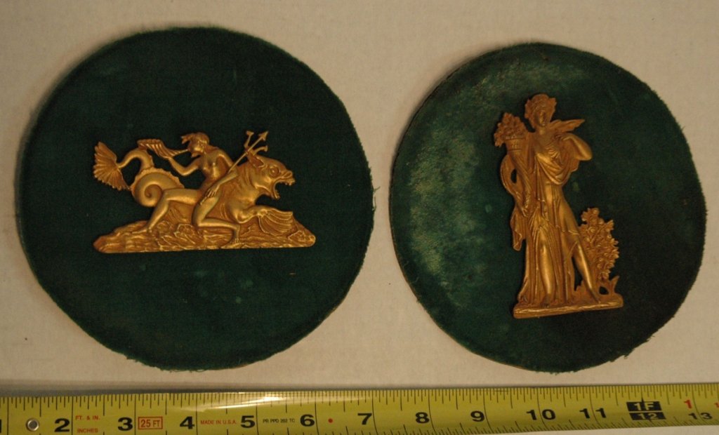 Two Gilt Bronze Furniture Mounts: 2 decorative gilt bronze furniture mounts on green felt backings.