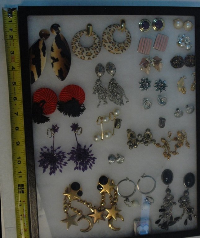 23 pairs of Vintage clip on & screw back earrings: Nina Ricci, Monet, and several other pairs of vintage earrings.