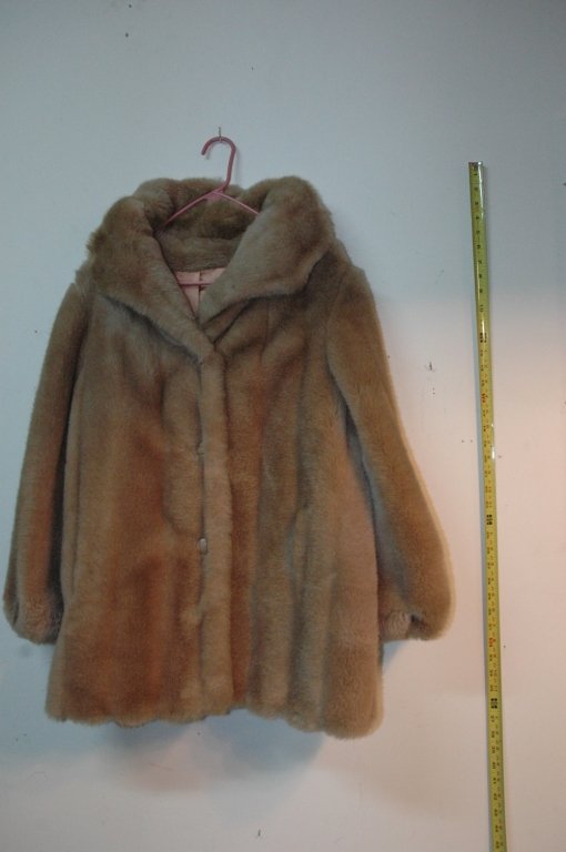 Light brown Mink Fur coat ??: Measures 34" in length.