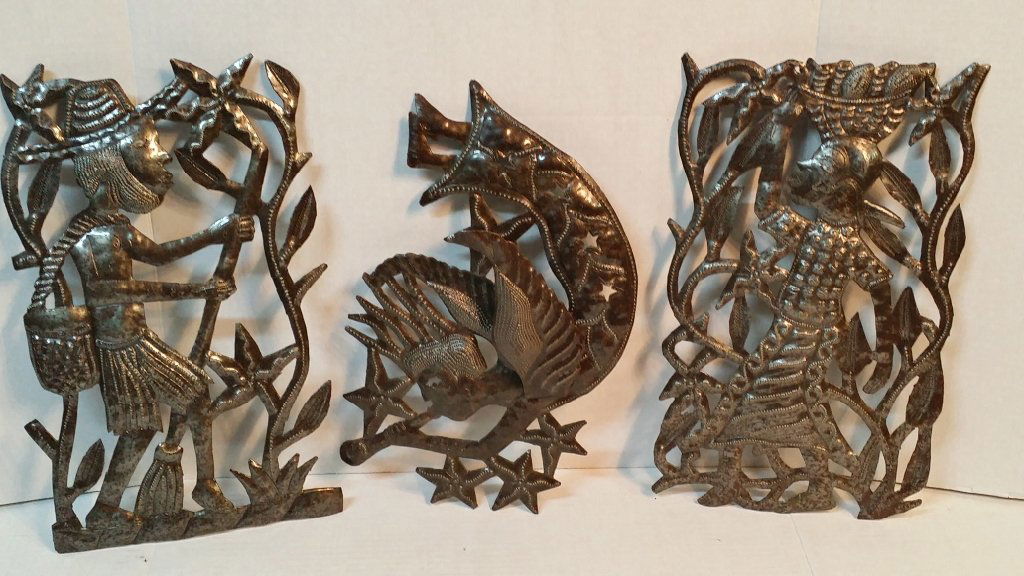 Delpe Fleurico (Haiti) 3 Steel cutouts: 3 Steel (oil drum?) cutouts in relief by the Haitian modern sculptor Delpe Fleurico