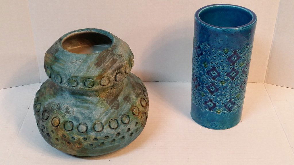 Two Midcentury Raymor pottery vases: A squat blue vase (7.75") with a raised dot pattern, and a taller unmarked blue vase (8.75").