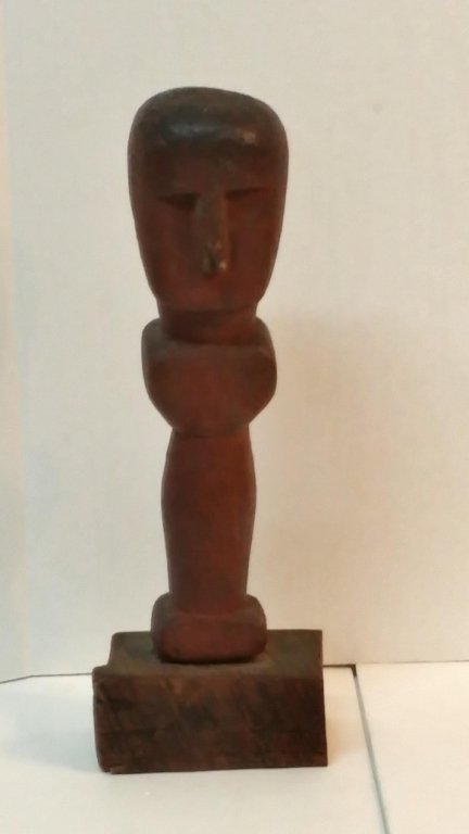 Antique Folk Art Red Painted Primitive Statue: An antique folk art statue with old red paint. Somewhat reminiscent of an Easter Island Moa.