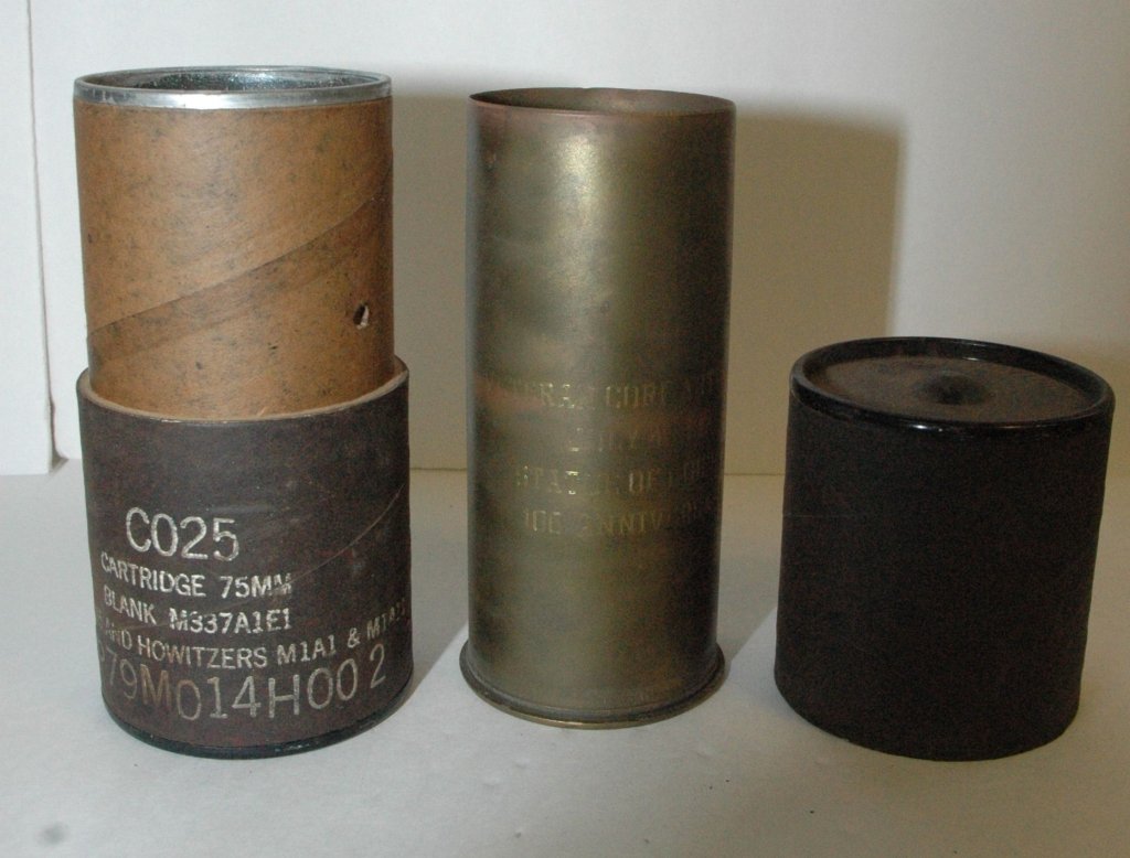 CO25 Cartridge 75MM Blank for M5 & Howitzers: Veteran Corp Artillery July 4th, 1987 / Statue of Liberty 100th Anniversary etched into the side of the shell. 8.25" X 3.75" diameter in the container.