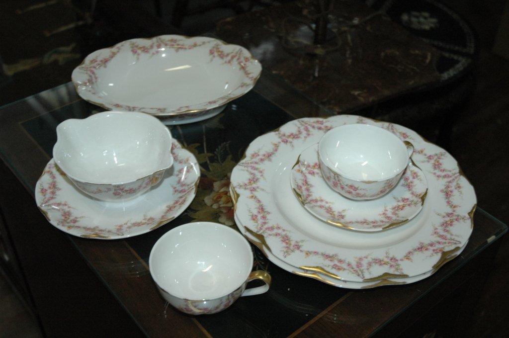 Theodore Haviland New York, made in USA. china: A popular pattern with draped pink roses marked "Theodore Haviland New York, made in America." not in perfect condition