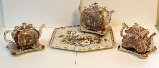 Rare English ironstone lot includes 3 Tea Pots: Rare English ironstone lot includes 3 teapots on trays and one large tray.