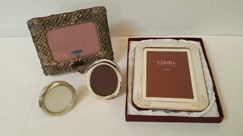 Collection of Sterling Silver Frames; Gorham, etc.: Gorham oval 5.25" tall, Wallace Silversmiths 8.25" X 7.25", Cunill 8" X 10", and a round 3.75" sterling frames.