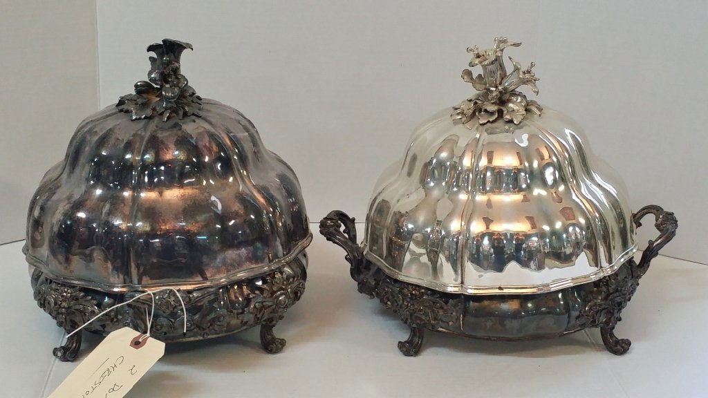 A pair of antique Christofle covered service domes: Two large antique Christofle silver plated domes. Ther first, with a polished dome, numbered "2", "9" in diamonds, with the "OC" scales mark, "Christofle", and serial numbered "18926". With a large "M