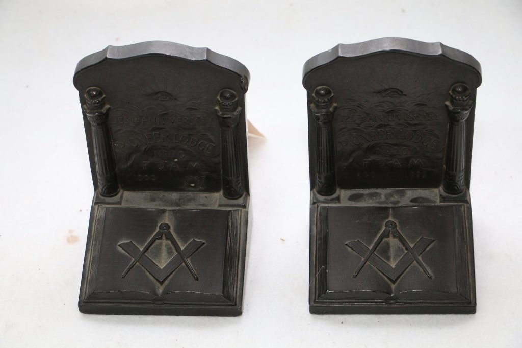 Pair of unusual Masonic bookends: A pair of Masonic bookends "125th anniversary/ Pioneer Lodge/ No 20/ F & A M/ 1800 1925". Some light overall wear.