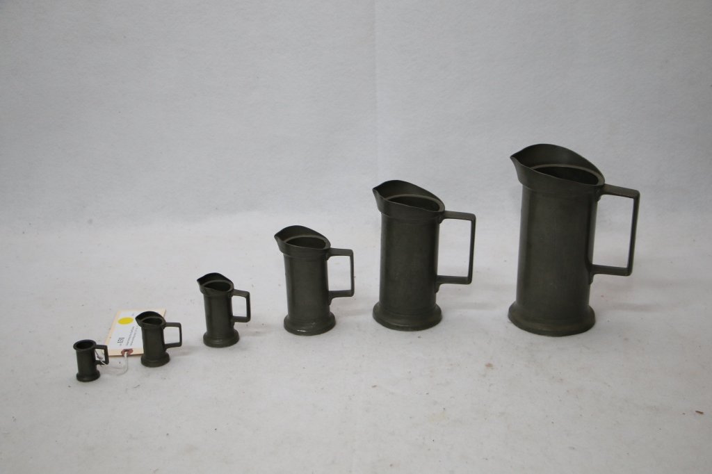 British Pewter Measuring Tankards; "VC Angers": Antique collection of British measuring cups / tankards.