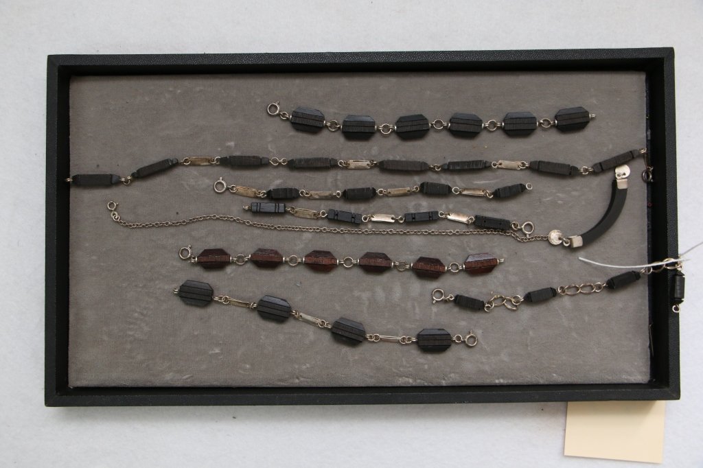 A Group of unusual Wood and .800 silver jewelry: Modern / Modernist jewelry lot- 8" bracelet, 15.25" choker, 7.75" bracelet, 7.25" bracelet, 14" choker, 7.75" bracelet, 8" bracelet,7.75" bracelet. No marks other than .800 silver marks. 8 pcs.