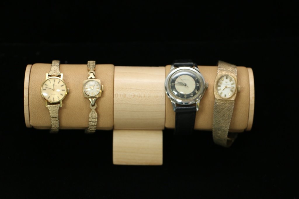 Group of 4 modern wristwatches: Ladies Longines, mid sized Omega, mid sized Bulova Accutron, and a Cortland.