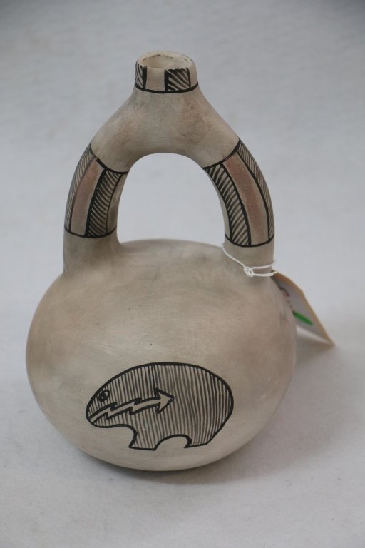 Navaho Wedding or Stirrup Bottle: Native American hand made pottery, 9.75" X 6" at its widest point.