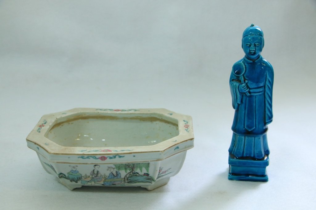 Chinese porcelain lot.: A blue glazed figure of a scholar carrying a scepter and a small porcelain planter with underglaze red mark. Figure is 8.25" h, planter is 8.5" at widest.