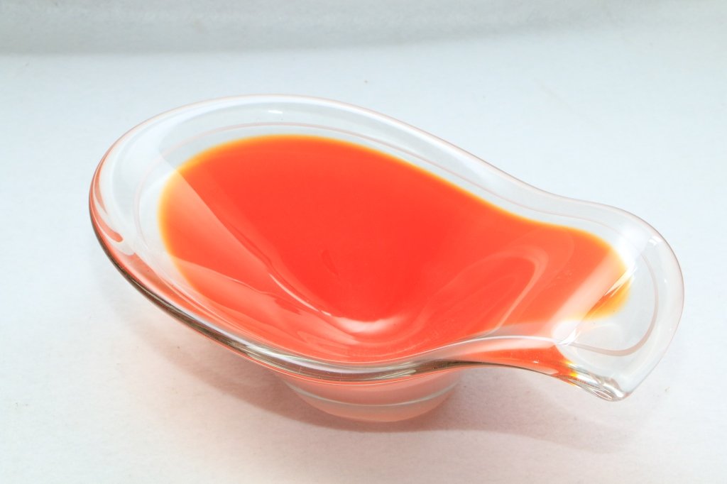 Flygsfors glass art glass bowl.: Signed and dated '62 on the bottom. Orange, clear and white. 13" x 8" x 4.75" h.