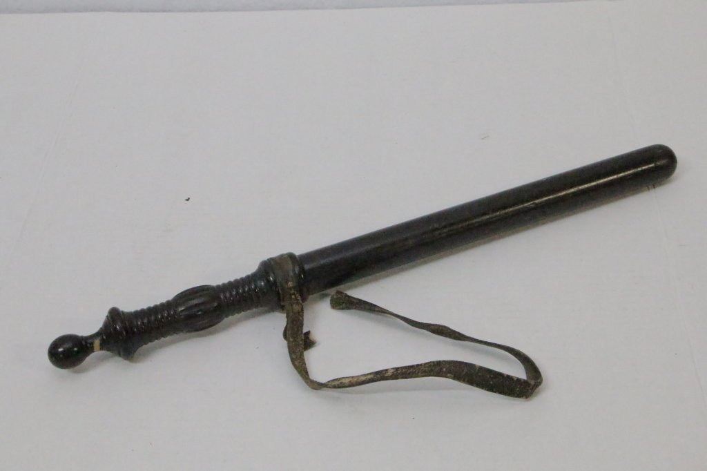 A truncheon or baton ( also called a Billy Club ): 20.5" in length