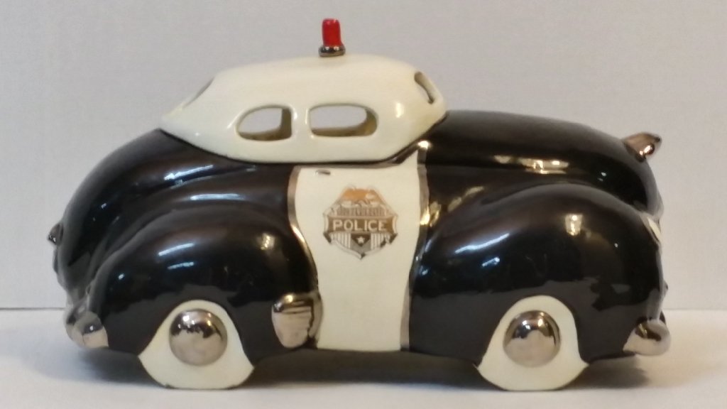 Glenn Appleman Police Car Cookie Jar: A Glenn Appleman Police Car cookie jar.