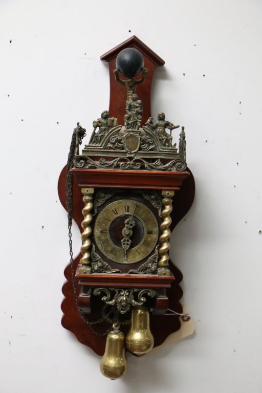 German Atlas Figural Atlas Mahogany & Brass Clock: Antique? German made with metal figural Atlas with world on his shoulders and figural trim with the words "NU Elck OD Syn Sin"; man on a horse pendulum; brass movement. Approx 26" without wieights.