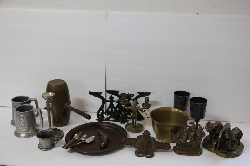 Large Lot of Silverplate and Metal Items.: Including an antique brass bowl, a 3 ring league baseball mug, a Ballantine Beer mug, a pair of as is Frankart elephant bookends (as is), a single bronze galleon bookend, 5 New York World's Fair spoon