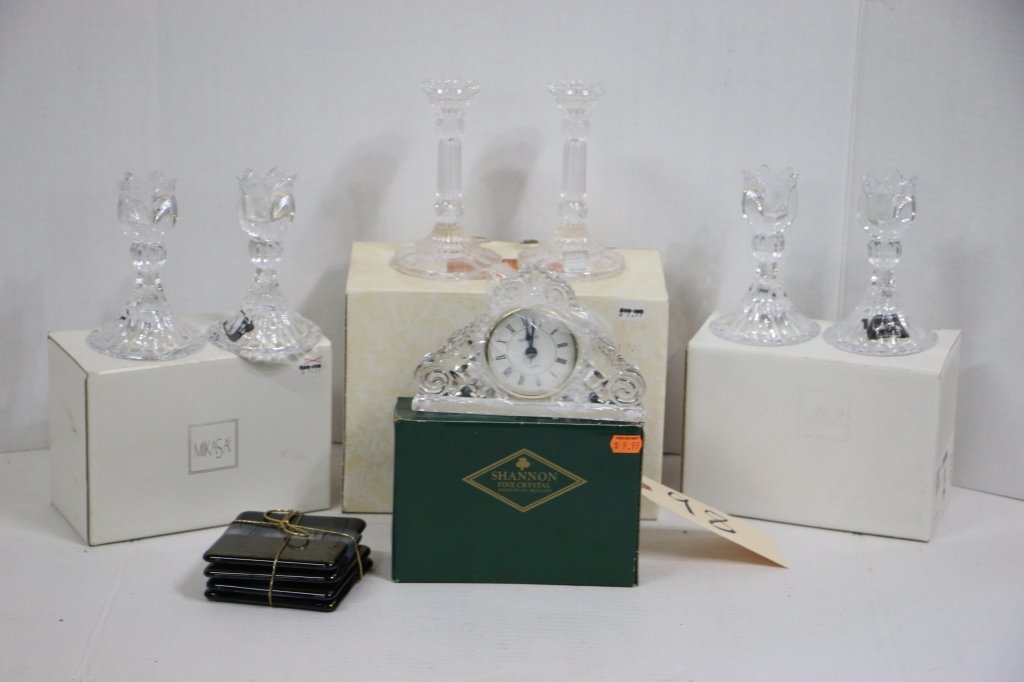 Crystal Collection; 5th Ave, Shannon, Mikasa: Assorted crystal candle holders, and colored glass coasters.