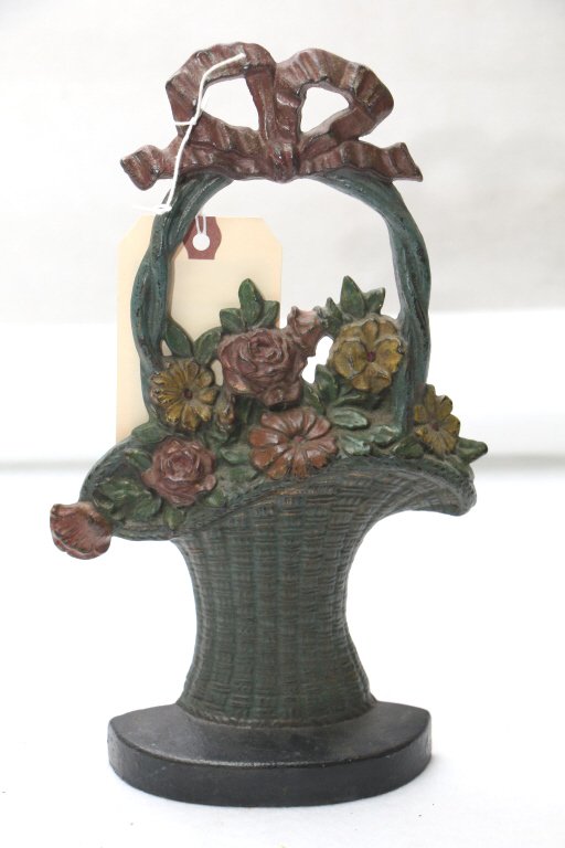 A Hubley "French Basket" doorstop: 11", Nice subdued paint.
