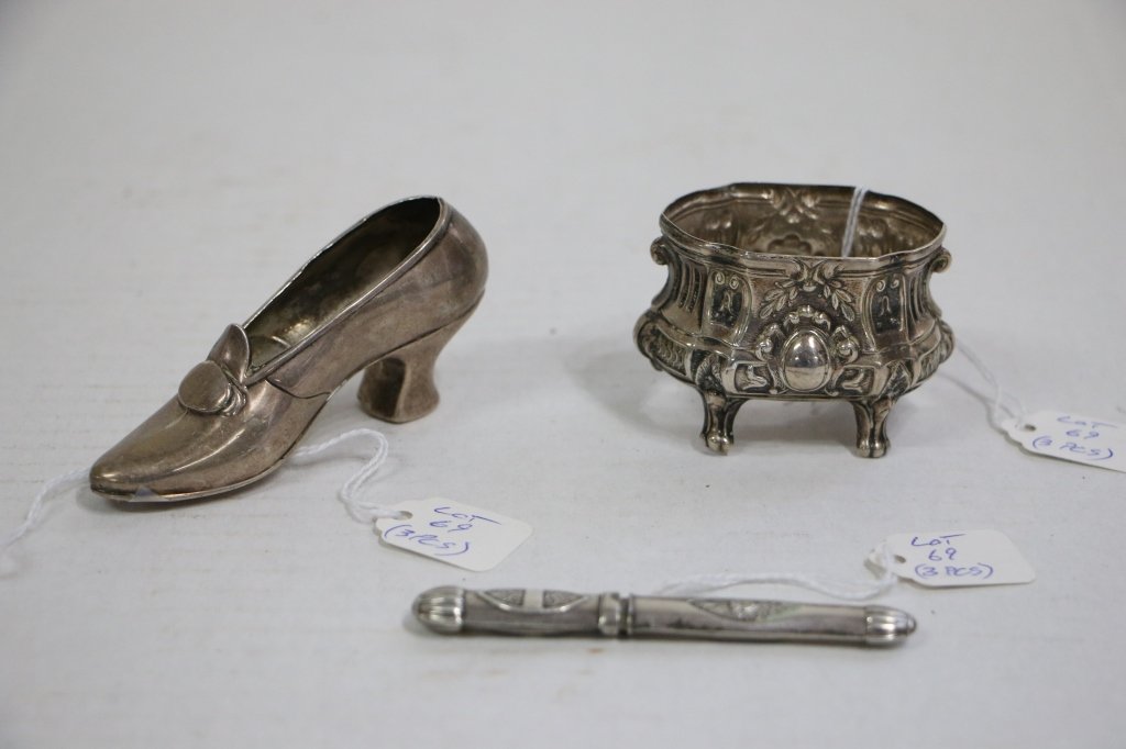 Silver Lot: An antique sterling silver high heeled shoe (Gorham). A sterling silver antique open salt (NO GLASS), "Sterling by Grand", and an antique needle case - unmarked?