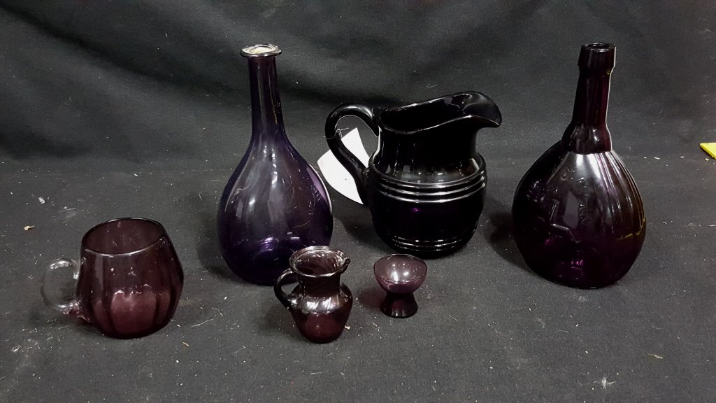 Jenny Lind Amethyst Glass Bottle & More: A heavy water pitcher, Jenny Lind bottle, decanter, and 2 small pitchers.