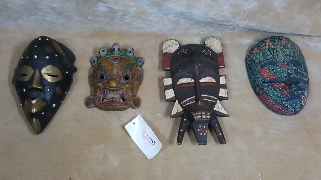 Carved and Painted Tribal Masks (1 of 2)