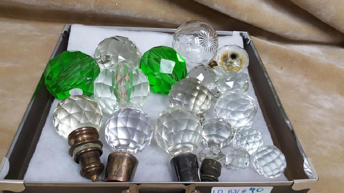 Cut Crystal Balls: Assorted size and colors, most are designed to hang in some way. there are some chips, scratches and damage. The largest is 3" and the smallest is .75" diameter.