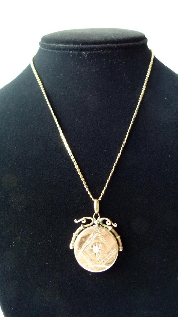 VICT. 14KT YW GOLD NECKLACE/MASONIC LOCKET W/ DIAMOND: VICTORIAN 14KT YELLOW GOLD NECKLACE/MASONIC LOCKET W/ DIAMOND CHIP, C. 1910 WEIGHT 10.5 GRAMS L. 16" LOCKET 1" D.