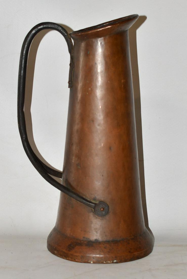 ARTS & CRAFTS HAMMERED COPPER/IRON EWER: ARTS & CRAFTS HAMMERED COPPER/IRON EWER, C. 1900 H. 13 1/2"