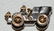 (3) CHARMS INCL. AUTO-PLATINUM GOLD, DIA., RUBIES - 7