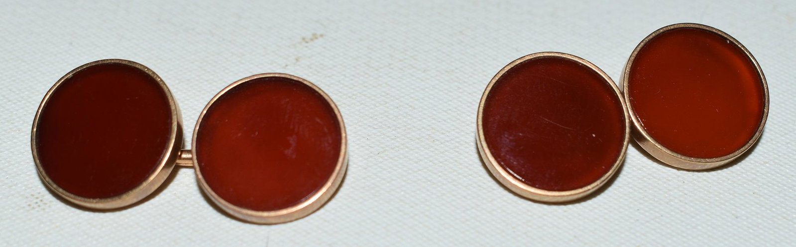14KT. ROSE GOLD CARNELIAN GEM CUFF LINKS, C. 1920: PAIR ART DECO 14KT. ROSE GOLD CARNELIAN GEM SET CUFF LINKS, C. 1920 WEIGHT 9.5 GRAMS