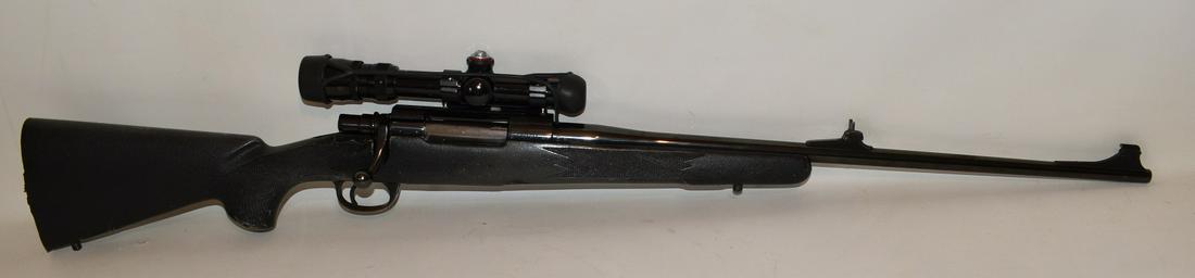 MARK X MAUSER 7 X 57 (7MM MAUSER) BELL & CARLSON STOCK: MARK X MAUSER 7 X 57 (7MM MAUSER) BELL & CARLSON STOCK, CUSTOM IRON SIGHT, BUSHNELL TROPHY 1.75 X 5X SCOPE, PACHMAYR LOW SWING QD MOUNT; SER. #B287870, ***NICS CHECK REQUIRED***